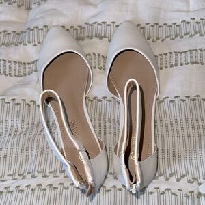 White flat shoes